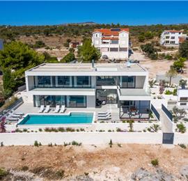 3 x 5 bedroom seafront villa with heated infinity pool near Rogoznica, sleeps 10